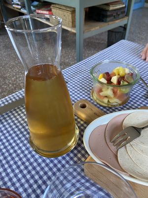 Great homemade apple/pear juice and homemade fruit salad for breakfast  at Bed and Breakfast 1889 in Sint Geertruid