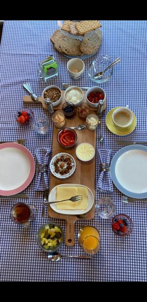 Breakfast table, fully vegan at Bed and Breakfast 1889 in Sint Geertruid