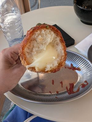 Cheesy corn dog filling at GangNam Falafel in Paris