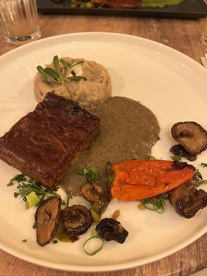 Oyster mushroom “roast” (?) with deliciously flavored shiitake mushrooms and veggies. Came with a well marinated salad    at Le Very'table  in Lunel