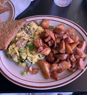 Spinach, onion, pepper, mushroom, plant based “egg”, dry whole wheat toast and potatoes  at Annette's in Salem