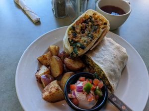 Vegan breakfast burrito, with home fries at Flying Saucer in Chicago