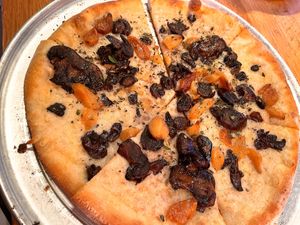 White pizza with vegan cheese and mushrooms   at Pies & Pints in Columbus