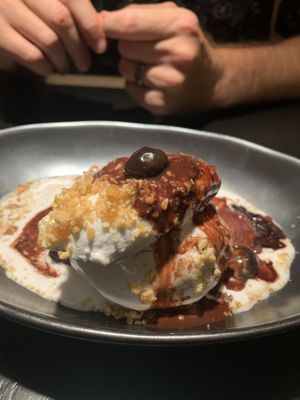 Brownie with taro ice cream, hot fudge and caramel crumbles.  at PLANTA Queen in New York City