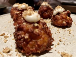 CAULIFLOWER TOTS
truffle almond parmesan, lemon aïoli at PLANTA Queen in New York City