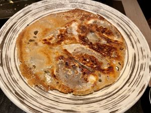CRISPY GYOZA
cabbage, carrot, cilantro, mushroom, chili sauce at PLANTA Queen in New York City
