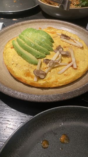 Avocado and mushroom omelette scramble on brunch special  at PLANTA Queen in New York City