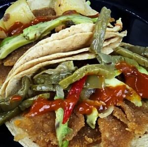 Tacos de milanesa 🙌🏼 at Taco Grass in Mexico City