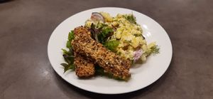 Letní bramborový salát s koprem, pečené tofu v sezamové krustě at Jídelna U tří Vegetariánů in Usti Nad Orlici