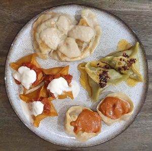From the top clockwise: sauerkraut/mushroom, spinach/tofu, mediterranean, bravas (a previous month special) at Dvmplin in London