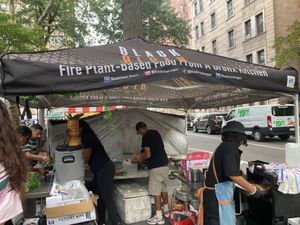 Kiosk at vegan street fair at Black Rican Vegan in Bronx