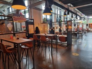 seating area next to Zoetekauw inside the Foodhall at Foodbar de Zoetekauw in Enschede