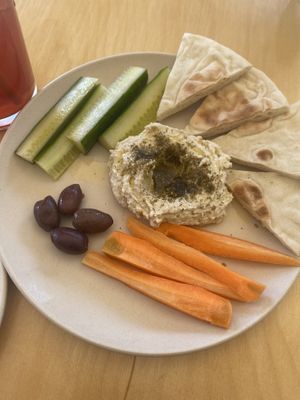 Hummus plate. Hummus: 4/5 (a little too garlicky for me, Ik,ik) but pita and sides were just meh   at Trillium Farm to Table in Laconia