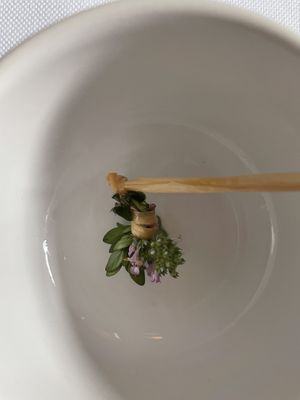 Beautiful bouquet with lemon verbena. A tomato tea was poured over this  at Eleven Madison Park in New York City