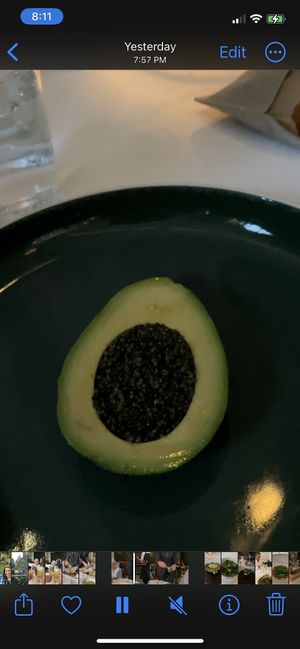Avocado with a seed or berry that I had never heard of which was outstanding - texture of caviar   at Eleven Madison Park in New York City