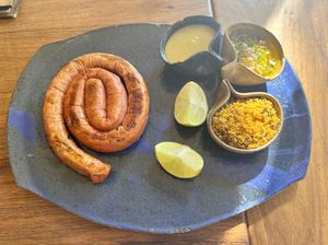 Sausage with dressings. Delicious!  at Allma Restaurante - Maybe closed in Rio De Janeiro