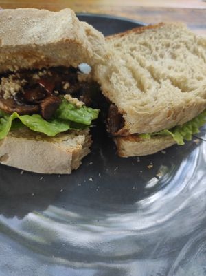 Sandwich de Choriqueso: Pan de masa madre, hummus, chorizo de hongos, y queso vegano, chucrut y lechuga at Etnofood in Oaxaca