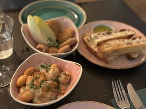Gnocchi with carbonara sauce, nuggets and bread and oil  at Pastan Bristol in Bristol