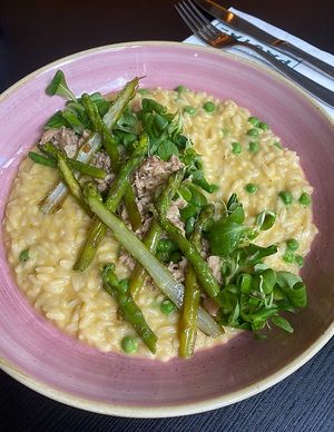 Amalfi Orzotto with OMNI Tuna. Orzo style risotto pasta with OMNI tuna, savoury lemon curd cheese sauce, asparagus and peas at Pastan Bristol in Bristol