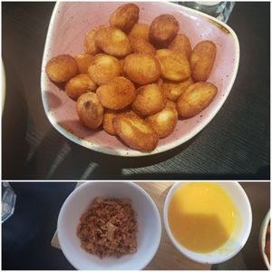 Gnocchi with cheese sauce and crispy onions at Pastan Bristol in Bristol