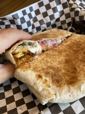 Crunchwrap — cut open at Subculture Vegan Deli & Provisions  in Albany