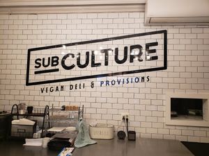 Behind counter at Subculture Vegan Deli & Provisions  in Albany