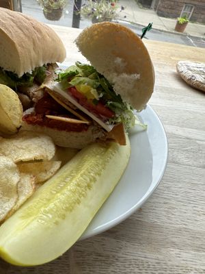 Italian mix with oil and vinegar with chips and a pickle  at Subculture Vegan Deli & Provisions  in Albany