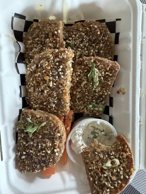 Everything Bagel Chicken Wings with onion and scallion cream cheese dipping sauce. Delicious   at Subculture Vegan Deli & Provisions  in Albany