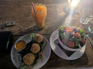 Vegan mushroom arancini with salad and fresh juice at Soak In Dampier in Dampier