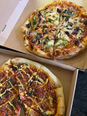 Luna pie with vegan cheese and Jardin with dairy cheese   at La Calavera in Atlanta