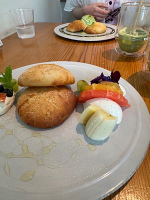 Fluffy pancakes with fruit (background, special fluffy pancakes with matcha cream) at AIN SOPH.Ginza in Tokyo