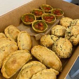 Pasties, tomato and pesto tartlets and wild garlic scones
 at Earthly Vegan Caterers in Cardiff