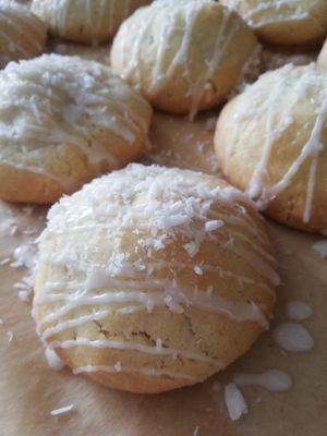 Pirate Booty: coconut rum cookies stuffed with a fresh pineapple and rum curd, drizzled in a vanilla glaze and sprinkled with coconut. at Angel's Sinfully Delicious Cookie Company in Long Eaton