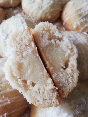 Pirate Booty: coconut rum cookies stuffed with a fresh pineapple and rum curd, drizzled in a vanilla glaze and sprinkled with coconut. at Angel's Sinfully Delicious Cookie Company in Long Eaton