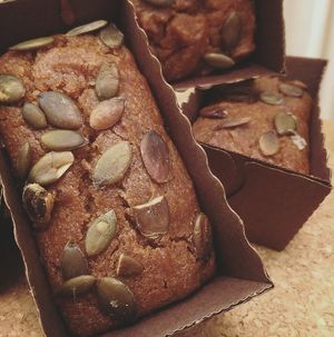 Punkin loaves: mini herbivore pumpkin loaves made with fresh pumpkin puree and delicious spices.  Light and fluffy, sweet, and sprinkled with pumpkin seeds or glaze at Angel's Sinfully Delicious Cookie Company in Long Eaton