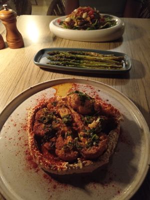 Cauliflower steak (served with chimichuri and hummus), asparagus and stuffed sweet potato at Salt & Pepper in Medulin