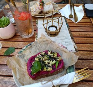 Beetroot hummus sandwich, lemonade and veggie wrap at Artelier Cafe & Bar in Bratislava