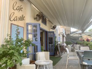 Outdoor seating on terrace at Cafe Castille in Valletta