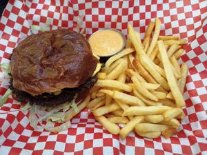 Smash burger and classic fries with Sriracha mayo at Kitsune Burgers in Brussels