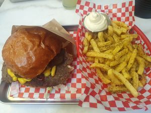 SIMPLE SMASH BURGER:
Hokkaido Buns, 1 Azuki falafel, vegan cheddar, white onions, cucumber pickles, Iceberg lettuce, mustard, Ketchup. FURIKAKE FRIES: seaweed & sesame. With Kewpie at Kitsune Burgers in Brussels