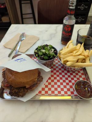 Smash burger with fries and slaw  at Kitsune Burgers in Brussels