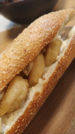 VEGANO BRAVO 
Bocadillo de calamares veganos hechos a base de soja y almidón de yuca con salsa veganesa. at A Flama in Zaragoza