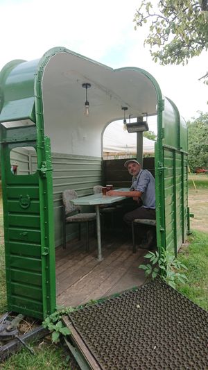 Quirky horsebox booth in the garden at The Fleece Inn in Bretforton