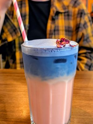 Iced rose and butterfly pea latte with oat milk at The Chakra Lounge in Sheffield