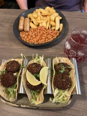 Falafel tacos and vegan sausage, chips and beans  at m'Eating Point in Llangollen
