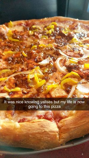 Vegan Cheese Pizza with onions on half, banana peppers, and tempeh and tofu both in BBQ at Mellow Mushroom in Myrtle Beach