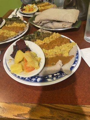Vegetarian Combination "Which Are All Vegan" served with tasteful Ethiopian bread called "Injera"  at Almaz Cafe in Philadelphia