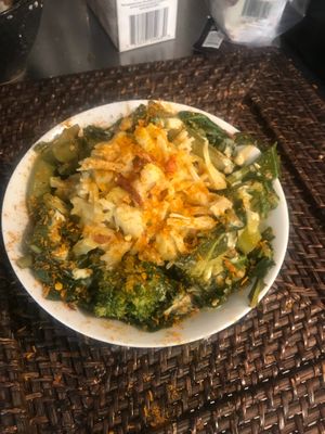 Delicious Afro-fusion build-a-bowl with  jackfruit, Gomen (Ethiopian collard greens), seasoned rice and coconut curry sauce. 
 vegan  at Halisi Africa in Tallahassee