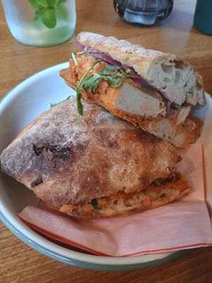 Tofu with butterbean sundried tomato paste on jalapeño cheese bread 🥪 at Lisa's Deli in Zwolle