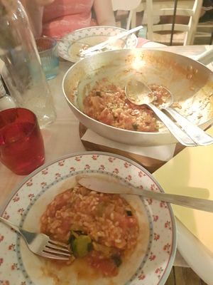 Vegan risotto, comes in a big pan so you can divide your own portions. Great atmospheric place, veeery salty but nice risotto! at Oštarija Peglez'n in Bled